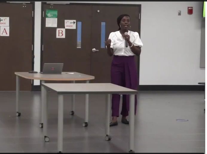 Dr. Cooper speaking at a professional development session