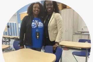 Dr. Cooper visiting a classroom
